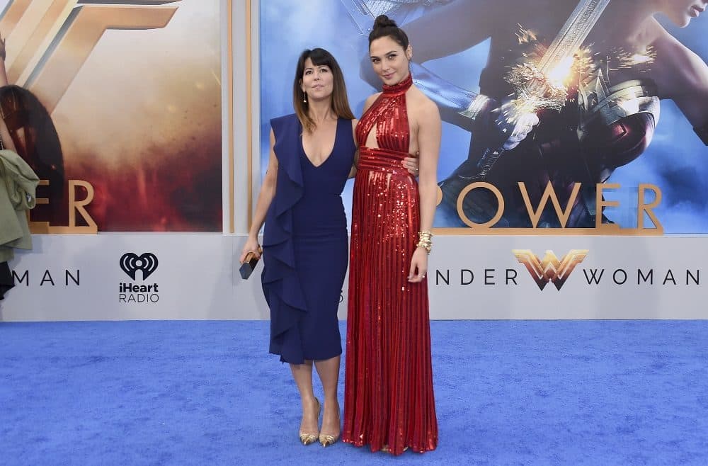 In this May 25, 2017 file photo, director Patty Jenkins, left, and actress Gal Gadot arrive at the world premiere of &quot;Wonder Woman&quot; at the Pantages Theatre in Los Angeles. The film grossed $103.1 million in North America over its debut weekend, a figure that easily surpassed industry expectations, set a new record for a film directed by a woman and bested all previous stand-alone female superhero movies put together. (Photo by Jordan Strauss/Invision/AP, File)