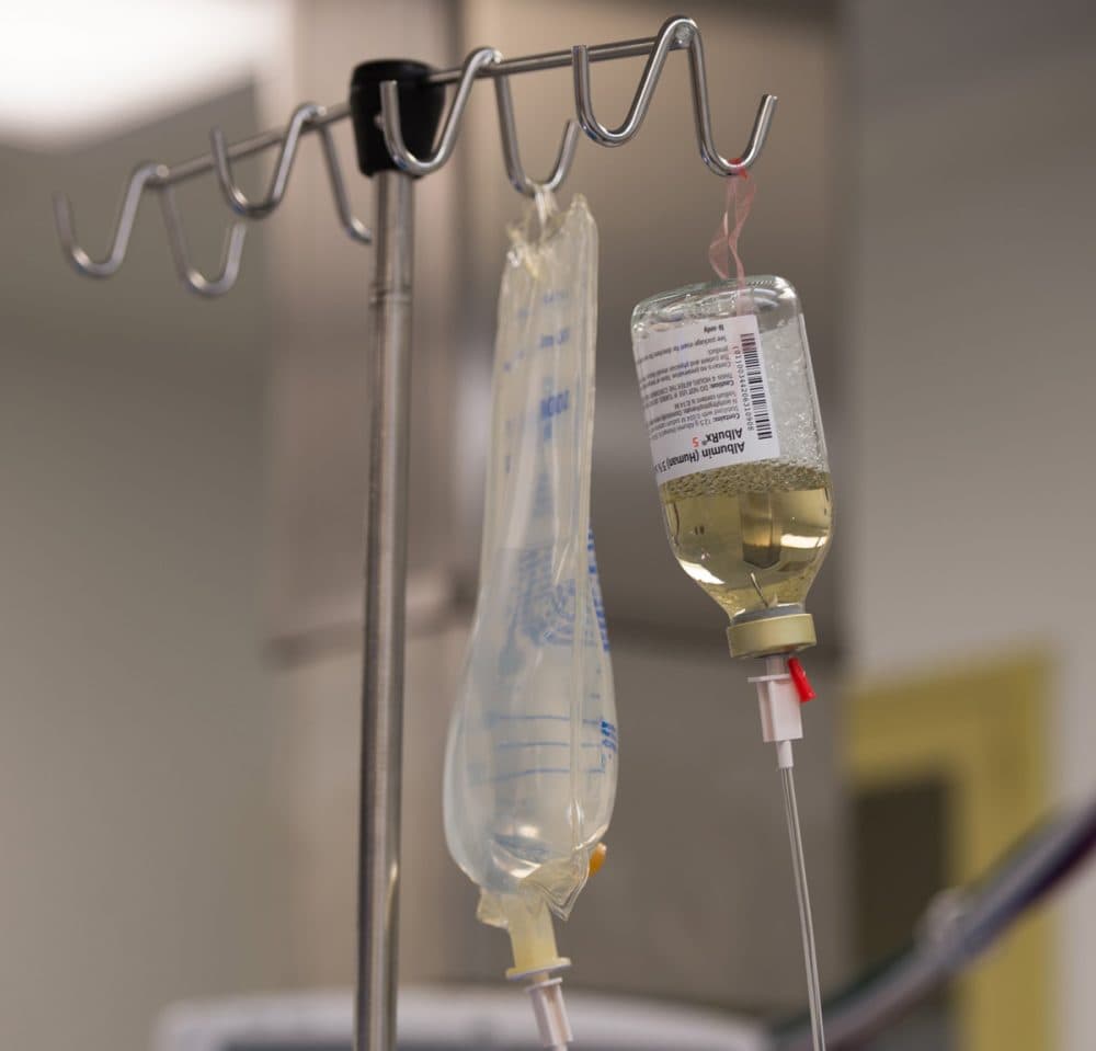 IV fluids hang inside an operating room during a kidney transplant surgery at MedStar Georgetown University Hospital in Washington D.C., Tuesday, June 28, 2016.    (AP Photo/Molly Riley)