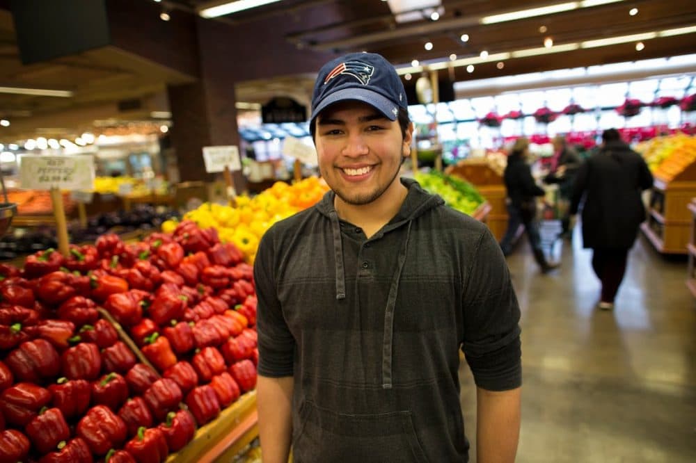 Guilherme “Gillie” Assuncao, who's 23, at Russo's in Watertown (Jesse Costa/WBUR)