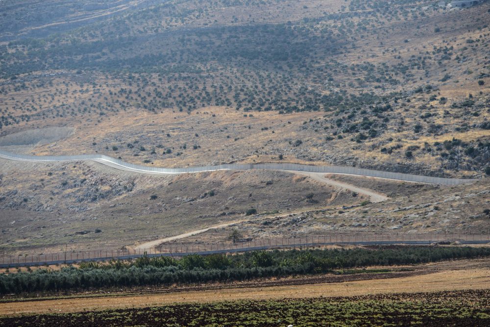 A picture taken on Oct. 9, 2017 from the Reyhanli district in Hatay, southern Turkey, shows the border wall separating Turkey from Syria. (Ilyas Akengin/AFP/Getty Images)