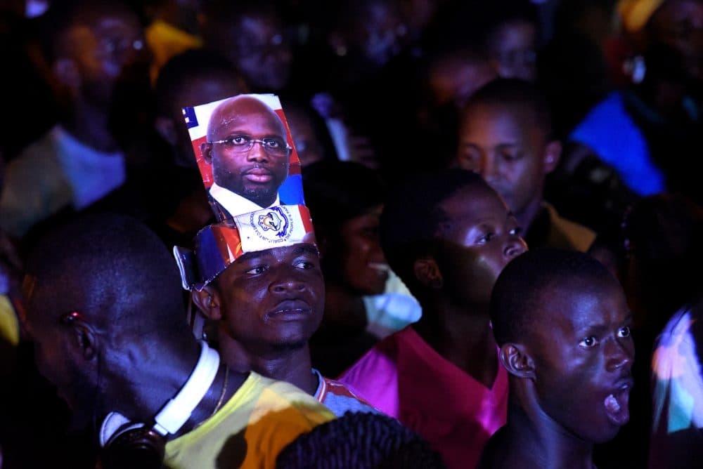 People gather to celebrate the victory of former soccer star George Weah in Liberia's presidential runoff, on Dec. 28, 2017 in Monrovia. (Seyllou/AFP/Getty Images)