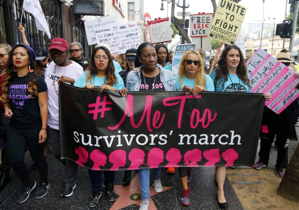 Participants march against sexual assault and harassment at the #MeToo March in Los Angeles on Nov. 12. (Damian Dovarganes/AP)
