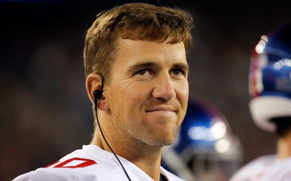 Eli Manning of the New York Giants will have a chance to start a new streak of consecutive starts a week after he was benched by Giants' lame duck management. (Jim Rogash/Getty Images)