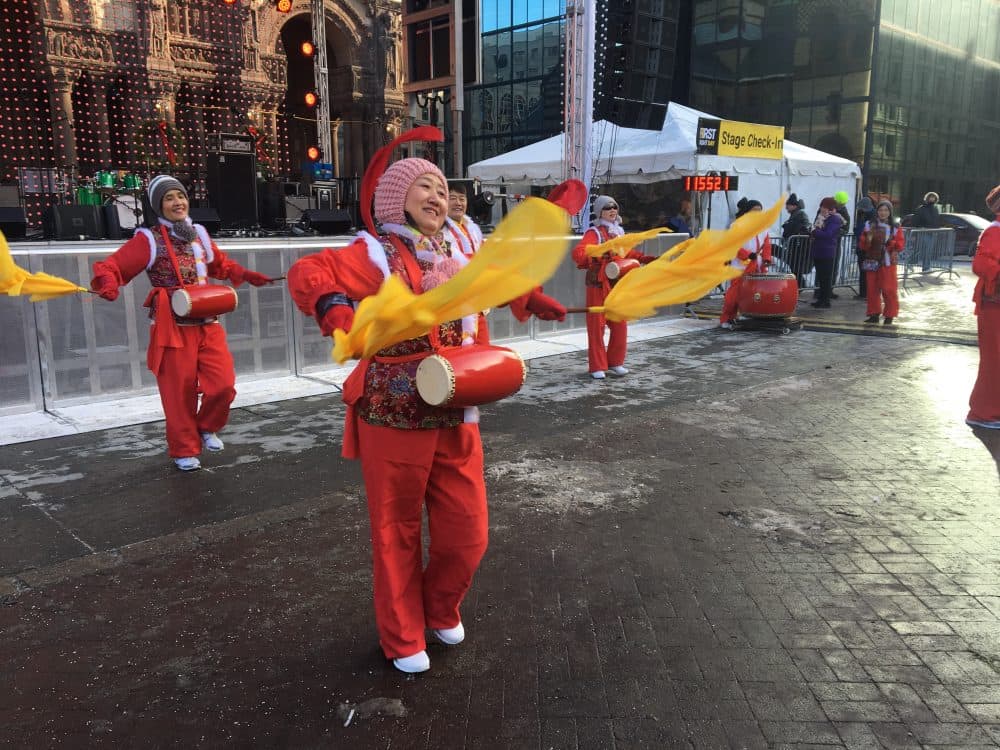 The Boston Chinese Waist Drum Troupe helps kick off First Night festivities in Copley Square. (Simon Rios/WBUR)