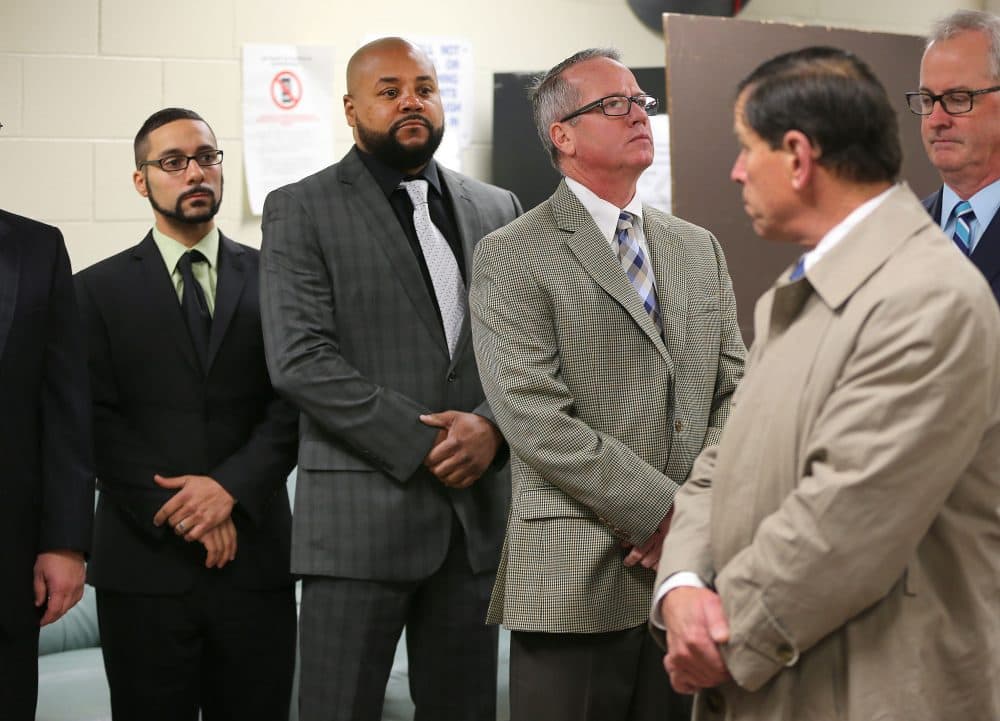 A viewing was held at Bridgewater State Hospital Wednesday in the trial of three former guards accused in the 2009 death of Joshua Messier. From left, the guards on trial are John Raposo, Derek Howard and George Billadeau, while Judge Jeffrey Locke, right, looks back at them. (John Tlumacki/Boston Globe, via Pool)