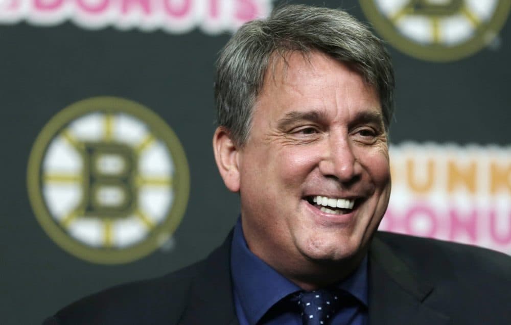 Boston Bruins president Cam Neely answers a reporter's question a news conference in Boston, Tuesday, May 20, 2014. The Bruins were eliminated from the NHL hockey playoffs by the Montreal Canadiens. (AP Photo/Charles Krupa)