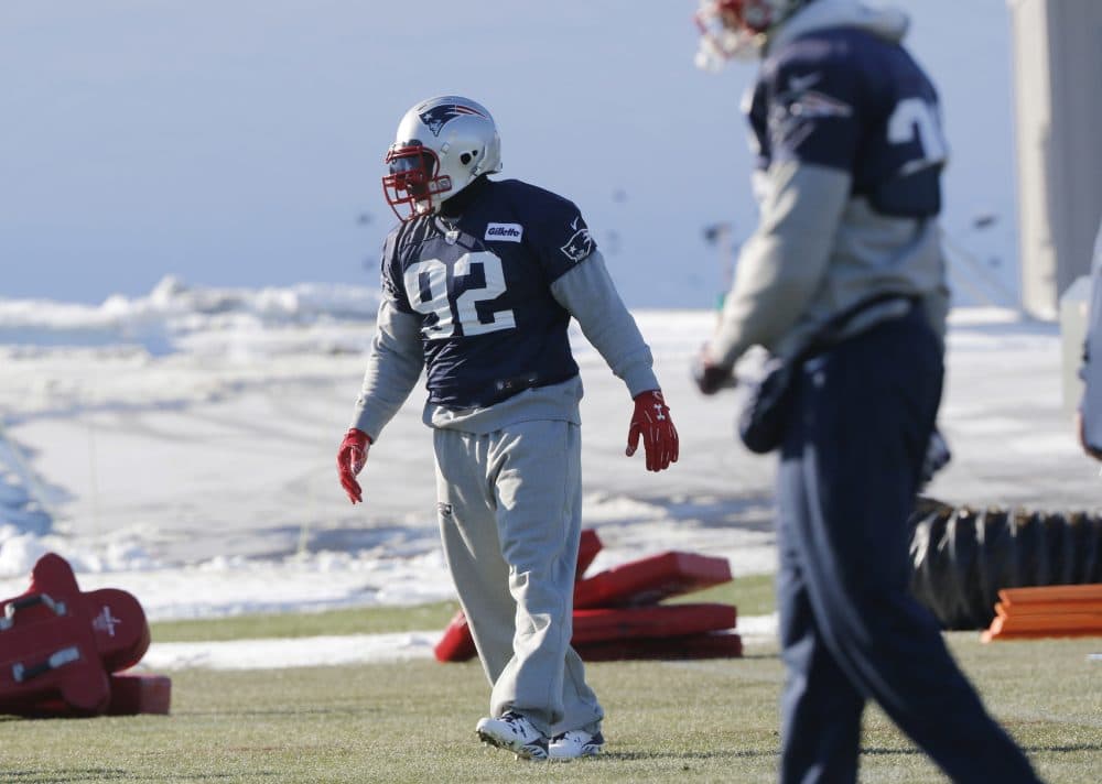 New England Patriots linebacker James Harrison walks across the field during an NFL football team practice Wednesday, Dec. 27, 2017, in Foxborough, Mass. The Patriots signed the 39-year-old, five-time Pro Bowl linebacker after he was released Saturday by the Pittsburgh Steelers. (AP Photo/Bill Sikes)