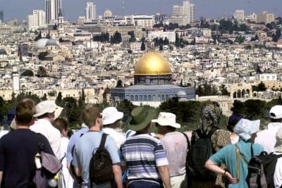 Tourists view the skyline of Jerusalem in this 2000 file photo. (AP)