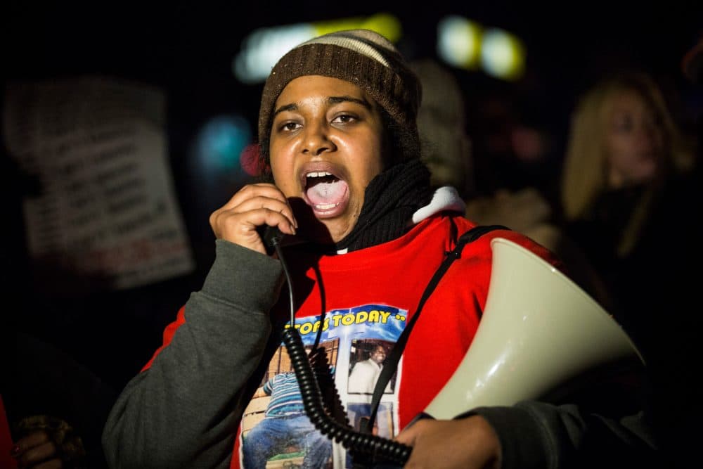 Erica Garner, daughter of Eric Garner, leads a march of people protesting the Staten Island, New York grand jury's decision not to indict a police officer involved in the chokehold death of Eric Garner in July, on Dec. 11, 2014. (Andrew Burton/Getty Images)