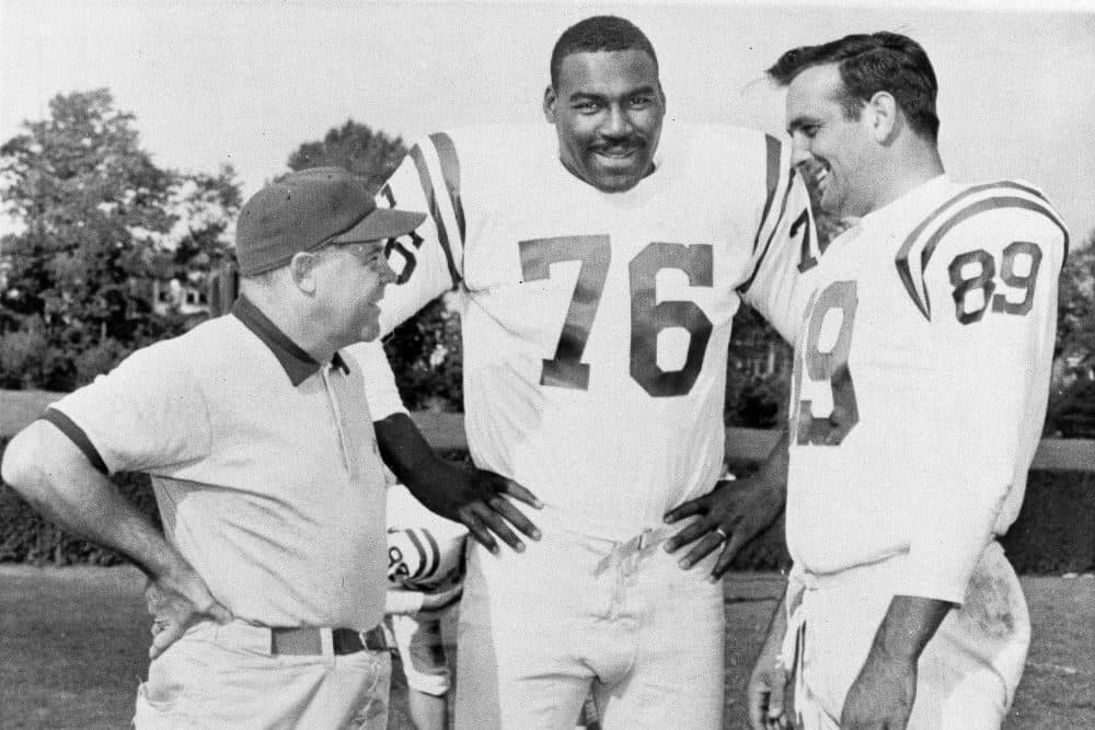 Baltimore Colts coach Weeb Ewbank (left) with players Gene Lipscomb (center) and Gino Marchetti in 1958. The Colts left Baltimore after the 1983 season. (William A. Smith/AP)