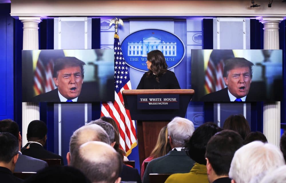 President Trump speaks via a video monitor to journalists at the White House in Washington during the daily press briefing with press secretary Sarah Huckabee Sanders, Thursday, Jan. 4, 2018. (Manuel Balce Ceneta/AP)