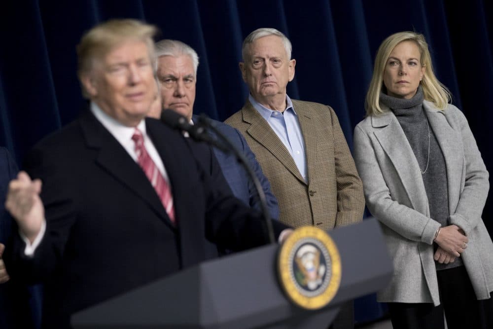 From left, President Trump, accompanied by Secretary of State Rex Tillerson, Defense Secretary Jim Mattis and Secretary of Homeland Security Kirstjen Nielsen, speaks to members of the media after participating in a Congressional Republican Leadership Retreat at Camp David, Md., Saturday, Jan. 6, 2018. (Andrew Harnik/AP)