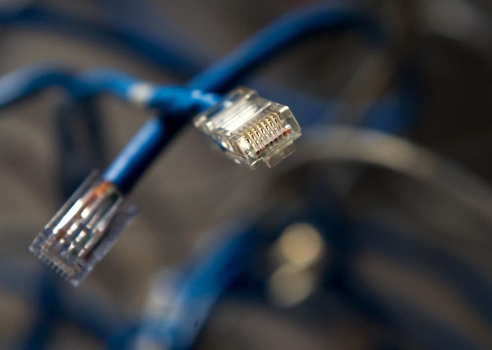 This May 26, 2014 photo shows ethernet connectors. (Karen Bleier/AFP/Getty Images)