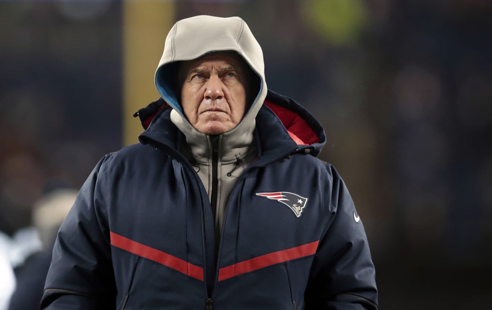 New England Patriots head coach Bill Belichick walks on the field before an NFL divisional playoff football game against the Tennessee Titans in Foxborough, Mass. (Charles Krupa/AP)