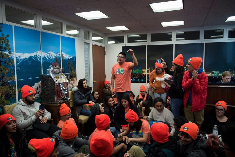 People advocate for Dreamers sit in the lobby of Sen. Dean Heller (R-Nev.)'s office on Capitol Hill, Jan. 16, 2018 in Washington, D.C. (Brendan Smialowski/AFP/Getty Images)