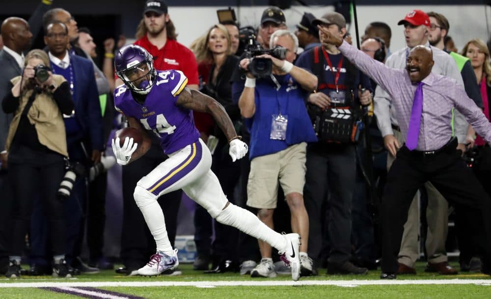 In this Sunday, Jan. 14, 2018, file photo, Minnesota Vikings wide receiver Stefon Diggs (14) looks back as he runs down the sideline for the game-winning touchdown Saints late in the second half of an NFL divisional football playoff game against the New Orleans in Minneapolis. The Vikings defeated the Saints 29-24. (Jeff Roberson, File/AP)