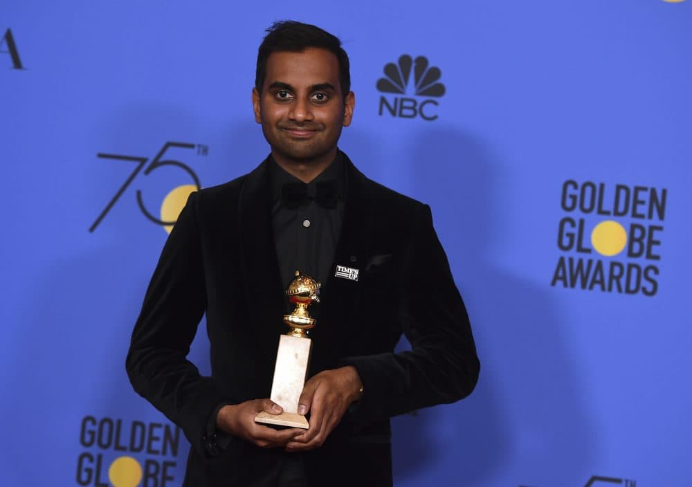 Aziz Ansari poses in the press room with the award for best performance by an actor in a television series - musical or comedy for &quot;Master of None&quot; at the 75th annual Golden Globe Awards. (Jordan Strauss/Invision/AP)