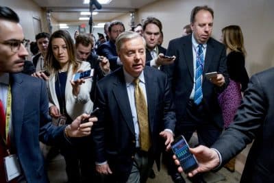 Sen. Lindsey Graham, R-S.C., speaks to reporters as he walks towards the Senate as Congress moves closer to the funding deadline to avoid a government shutdown on Capitol Hill in Washington, Thursday, Jan. 18, 2018. (Andrew Harnik/AP)