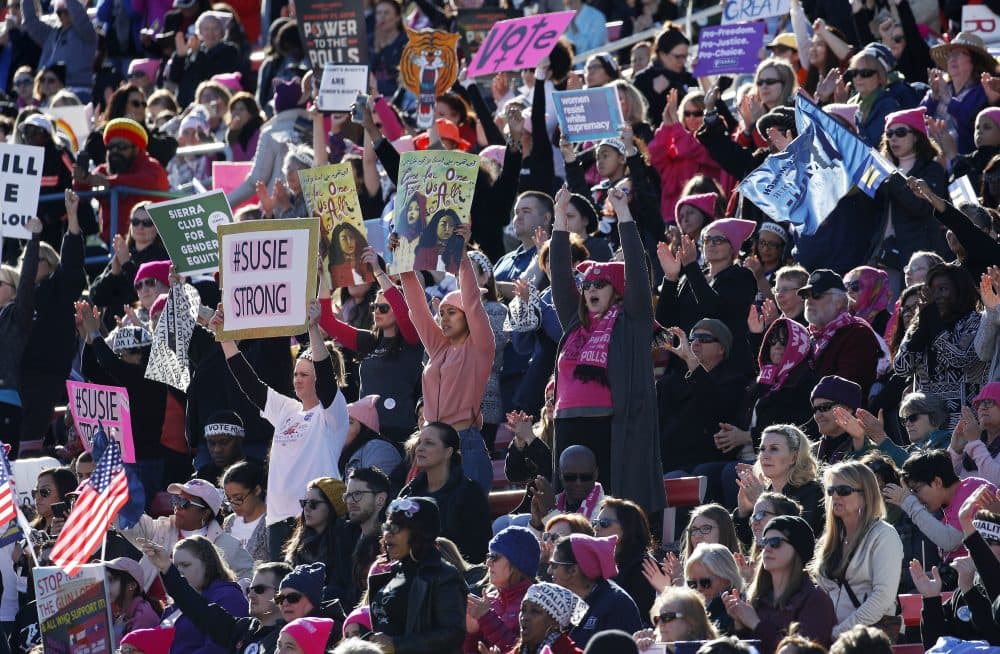 People cheer during a Women's March rally Sunday, Jan. 21, 2018, in Las Vegas. (John Locher/AP)