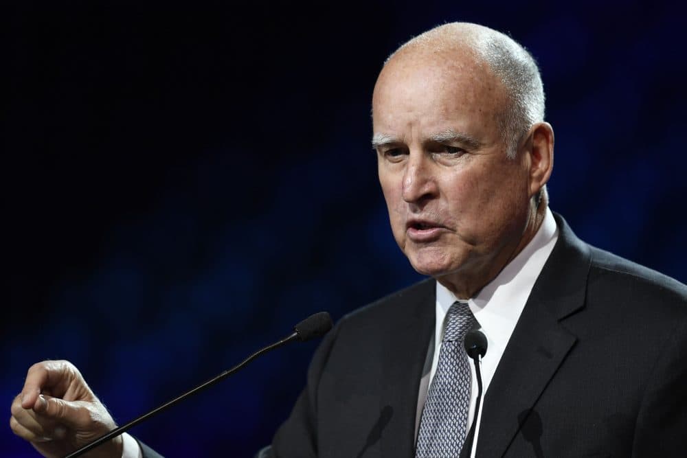 California Gov. Jerry Brown speaks during a panel conference at the One Planet Summit on Dec. 12, 2017, at La Seine Musicale venue on l'ile Seguin in Boulogne-Billancourt, west of Paris. (Eric Feferberg/AFP/Getty Images)