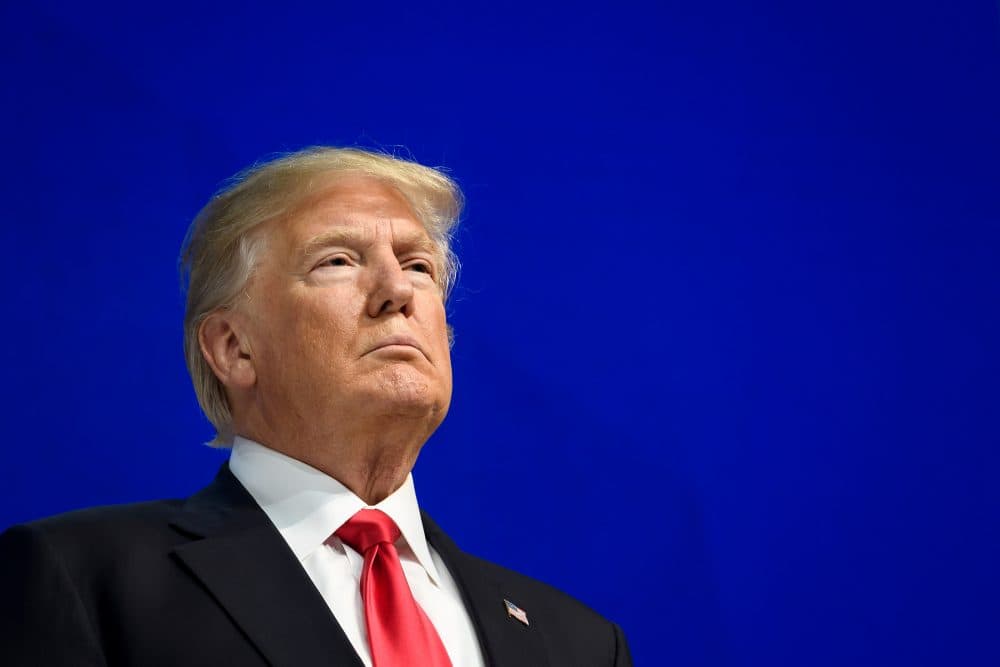 President Trump looks on before delivering a speech during the World Economic Forum annual meeting on Jan. 26, 2018 in Davos, Switzerland. (Fabrice Coffrini/AFP/Getty Images)