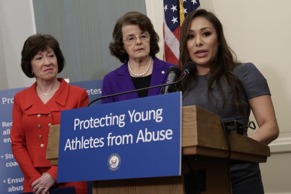 former Team USA gymnast Jeanette Antolin, right, accompanied by Sen. Susan Collins, R-Maine, left, and Sen. Dianne Feinstein, D-Calif., ranking member on the Senate Judiciary Committee, speaks during a news conference on Capitol Hill in Washington, Tuesday, March 28, 2017, to call on Congress to pass legislation that would require amateur athletics governing bodies to immediately report sex-abuse allegations to law enforcement and strengthen oversight of member gymnasiums and coaches. (AP Photo/J. Scott Applewhite)