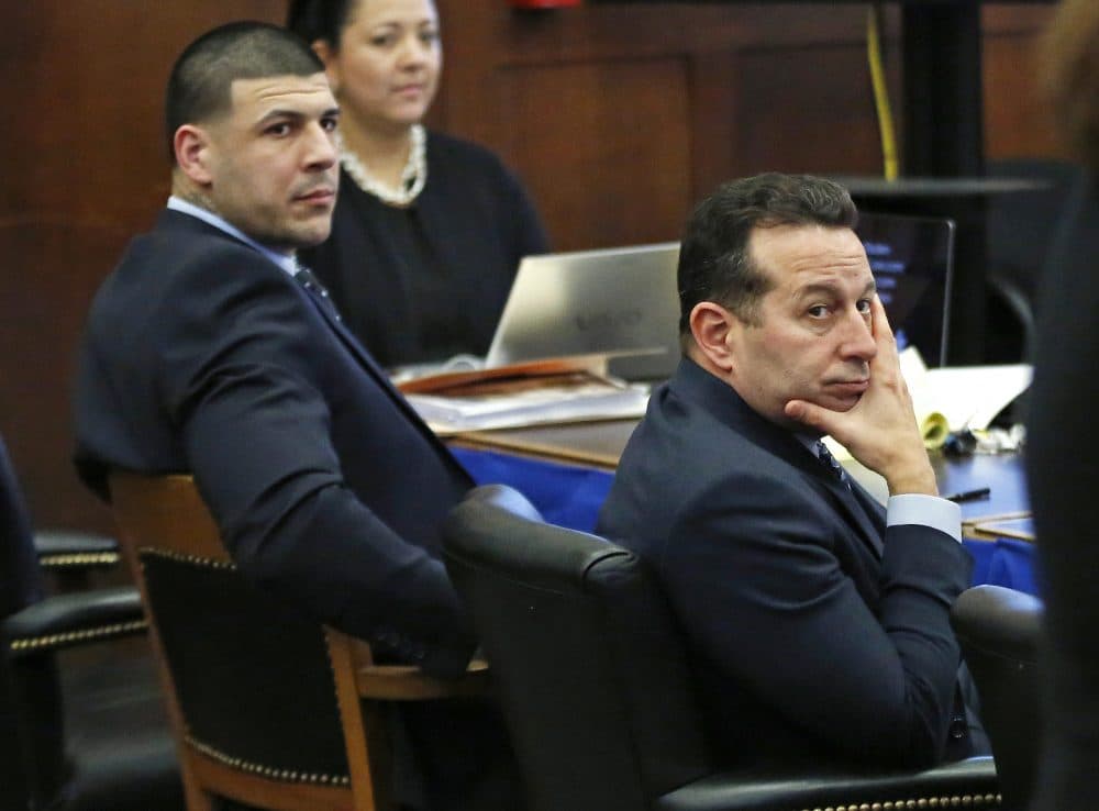 Jose Baez (right) with Aaron Hernandez during Hernandez's murder trial in March 2017. Baez is writing a book about Hernandez's life (Elise Amendola/AP/file)