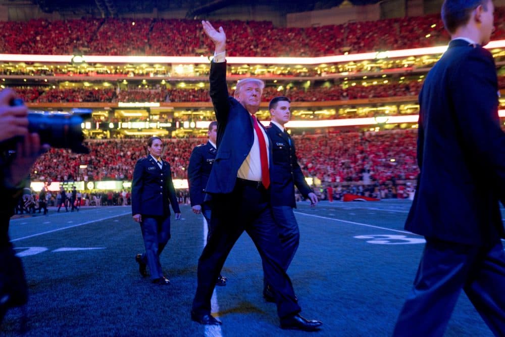 President Donald Trump walks off the field following the national anthem before the start of the NCAA National Championship game at Mercedes-Benz Stadium, Monday, Jan. 8, 2018, in Atlanta, between Alabama and Georgia. (Andrew Harnik/AP)