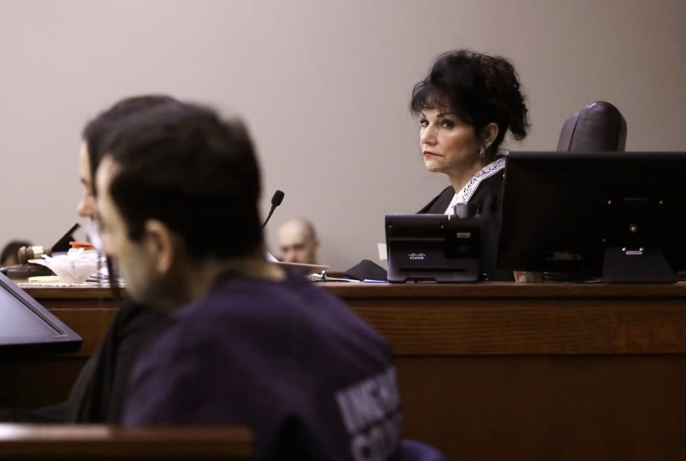 Judge Rosemarie Aquilina looks towards Larry Nassar as a victim gives her impact statement during the seventh day of Larry Nassar's sentencing hearing Wednesday, Jan. 24, 2018, in Lansing, Mich.
 (Carlos Osorio/AP)