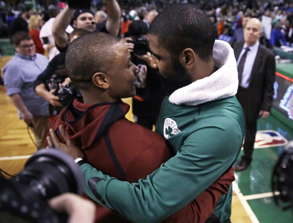 Boston Celtics guard Kyrie Irving, right, embraces Cleveland Cavaliers guard Isaiah Thomas after an NBA basketball game in Boston, Wednesday, Jan. 3, 2018. The Celtics won 102-88. (AP Photo/Charles Krupa)