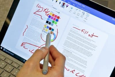 In this Tuesday, May 16, 2017, photo, Microsoft's new Surface Pro laptop-tablet hybrid is displayed, in New York. The Surfaces stylus will now mimic pencil shading when tilted, much like the Apple Pencil for iPad Pro tablets. Along with this, Microsoft plans upgrades to its popular Office software with new pencil-like features. (AP Photo/Bebeto Matthews)