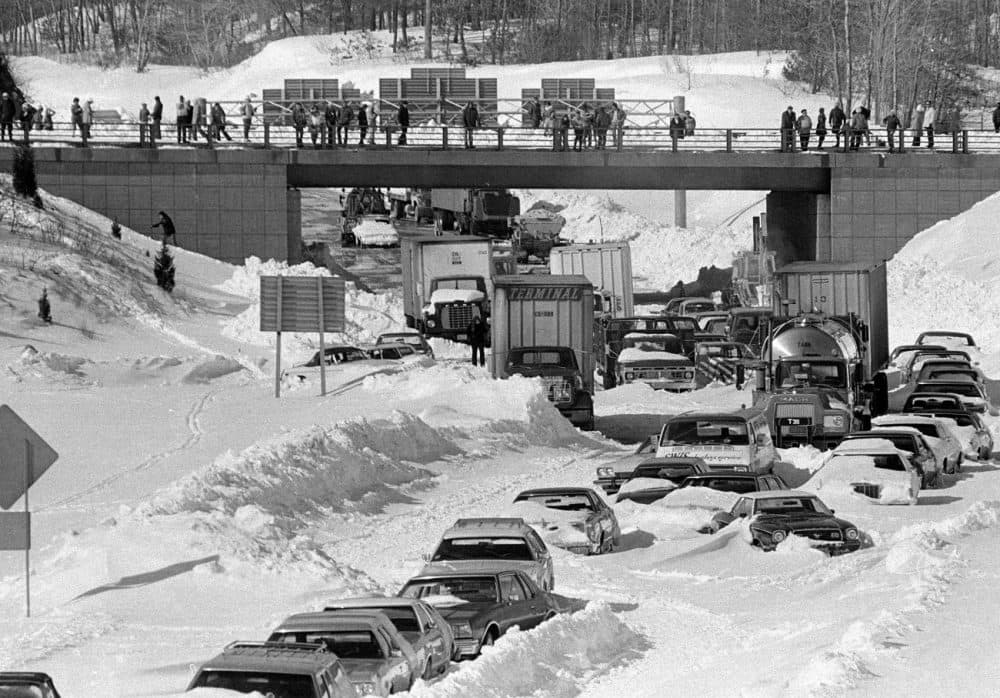 Cars and trucks stranded and abandoned in deep snow along Route 128 in Dedham are seen on Feb. 9, 1978. (AP)