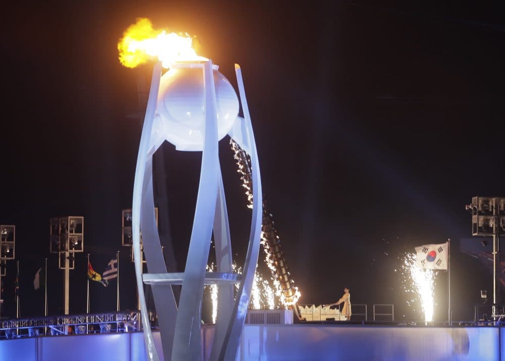 The Olympic flame is lit and the games are underway. (Dmitri Lovetsky/AP)