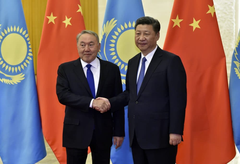 Kazakhstan President Nursultan Nazarbayev (left) and Chinese President Xi Jinping shake hands before their meeting at the Great Hall of People, on the sidelines of the Belt and Road Forum, in Beijing, China, 14 May 2017. (Kenzaburo Fukuhara - Pool/Getty Images)