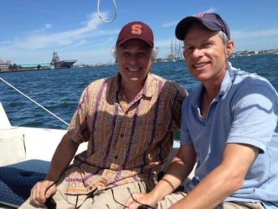 Chip Fanelli, left, and Chris Allen, sit together on a boat. (Courtesy Cory Fanelli)