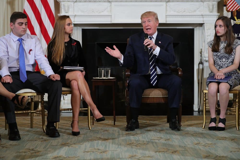 President Trump (center) speaks during a listening session with Marjory Stoneman Douglas High School students who survivied last weeks mass shooting (left to right): Jonathan Blank, Julie Cordover and Carson Abt, and others at the White House Feb. 21, 2018 in Washington, D.C. (Chip Somodevilla/Getty Images)