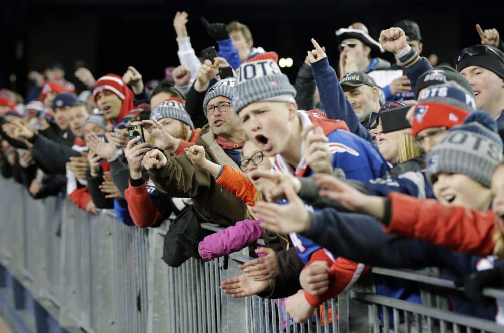 Patriots fans cheer as Patriots players leave the field after the AFC championship game against the Jaguars, on Jan. 21, 2018, in Foxborough, Mass. The Patriots won 24-20. (David J. Phillip/AP)