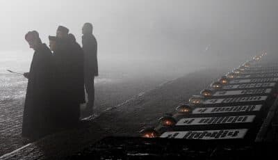 Representatives of various religious congregations gather at the former Nazi German concentration and extermination camp Auschwitz II-Birkenau, on International Holocaust Remembrance Day in Oswiecim, Poland, Saturday, Jan. 27, 2018. (Czarek Sokolowski/AP)