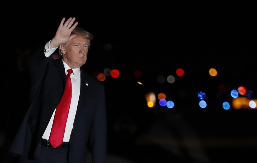 President Donald Trump waves as he arrives on Air Force One at Palm Beach International Airport, in West Palm Beach, Fla., Friday, Feb. 2, 2018. (Carolyn Kaster/AP)