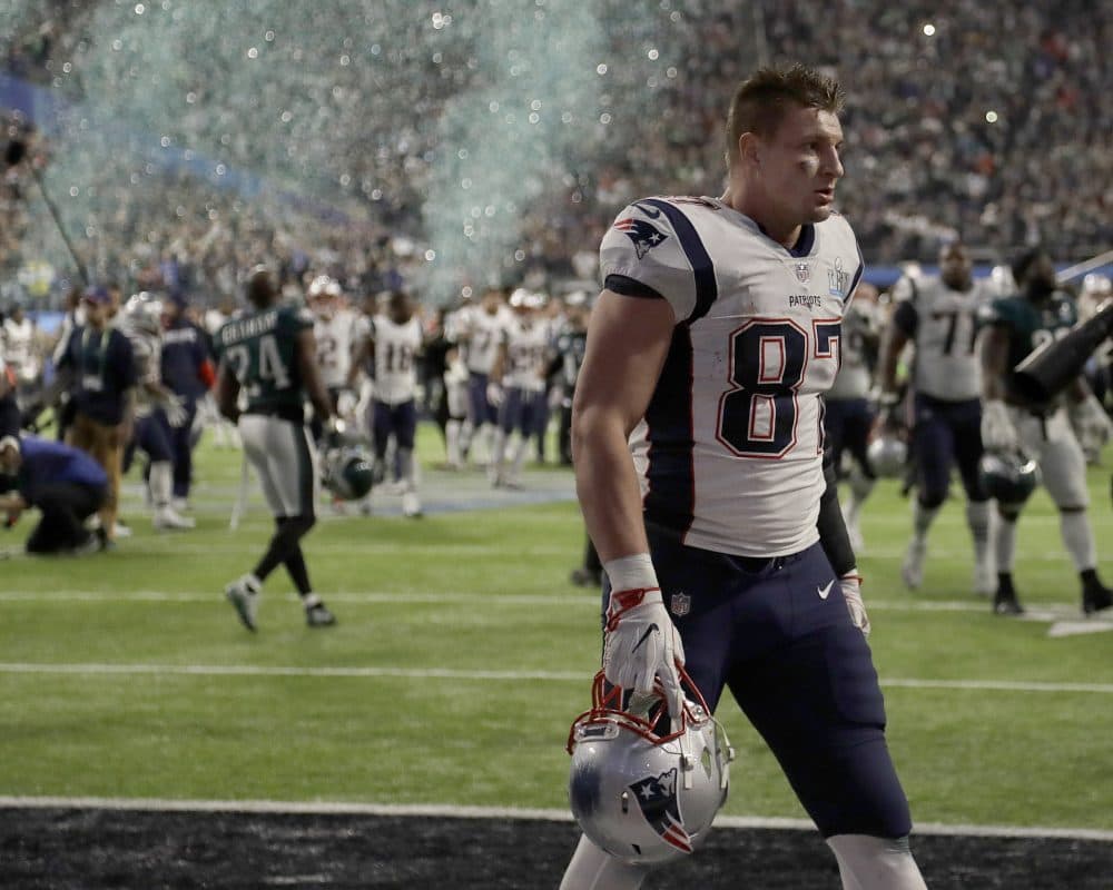Patriots' Rob Gronkowski walks off the field after Super Bowl 52. The Eagles won 41-33. (Chris O'Meara/AP)