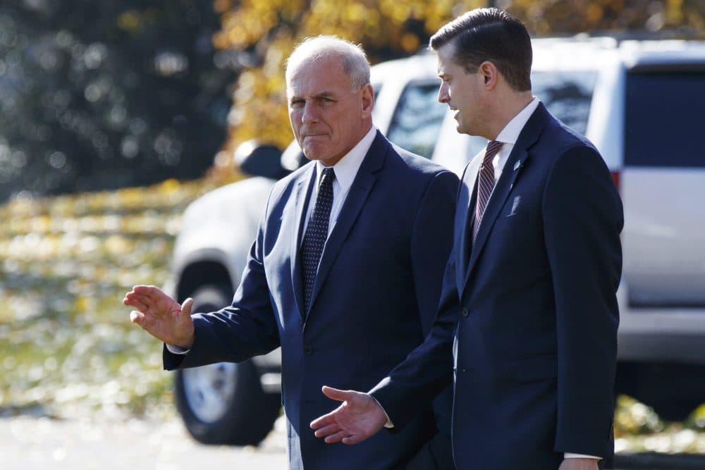 In this Nov. 29, 2017 file photo, White House Chief of Staff John Kelly, left, walks with White House staff secretary Rob Porter to board Marine One on the South Lawn of the White House in Washington. (Evan Vucci/AP)
