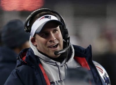 New England Patriots offensive coordinator Josh McDaniels watches from the sideline during the second half of an NFL divisional playoff football game against the Tennessee Titans, Saturday, Jan. 13, 2018, in Foxborough, Mass. (AP Photo/Charles Krupa)