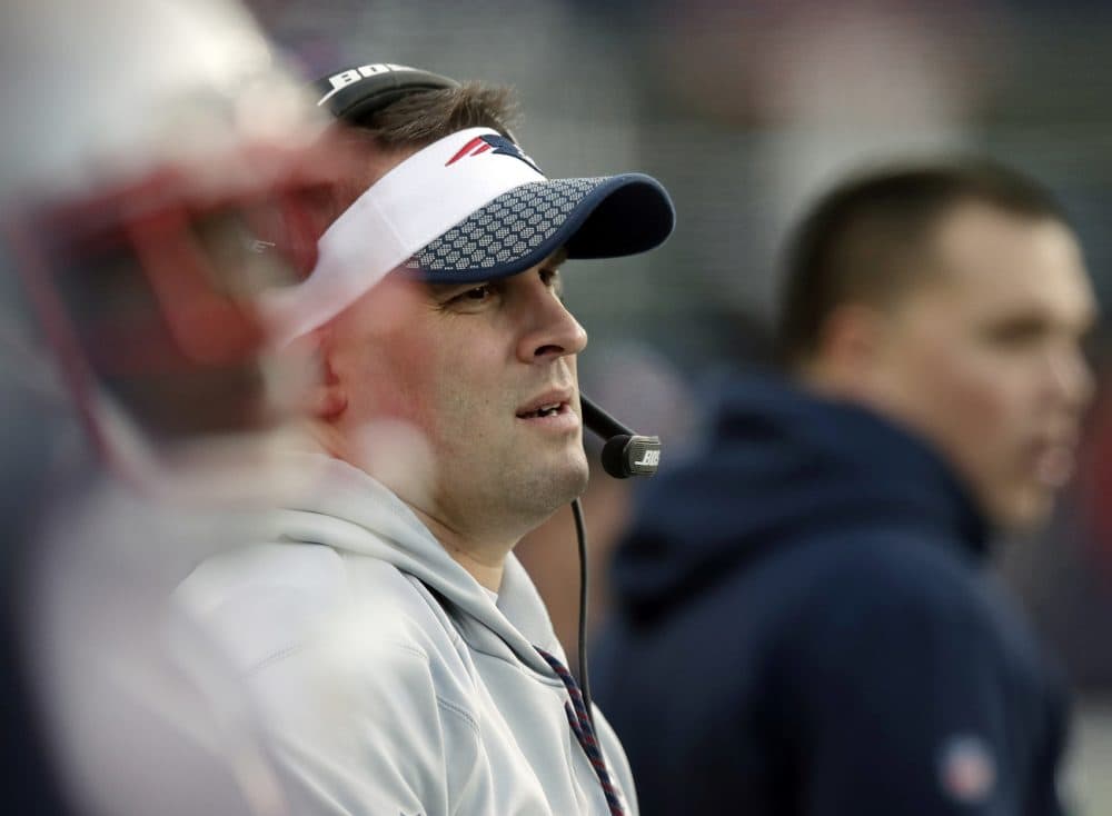 New England Patriots offensive coordinator Josh McDaniels watches from the sideline during the first half of the AFC championship NFL football game against the Jacksonville Jaguars, Sunday, Jan. 21, 2018, in Foxborough, Mass. (AP Photo/Charles Krupa)