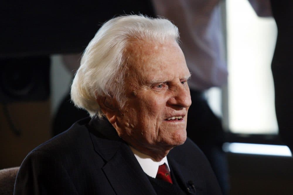 In this Dec. 20, 2010 file photo, evangelist Billy Graham speaks during an interview at the Billy Graham Evangelistic Association headquarters in Charlotte, N.C. (AP Photo/Nell Redmond, File)