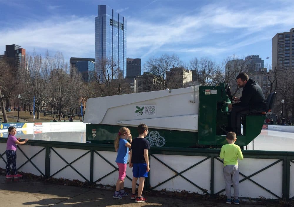 A Zamboni makes the rounds in Frog Pond Wednesday, a record warm day in Boston. (Miranda Suarez for WBUR)
