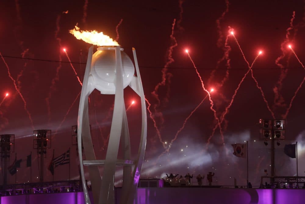 Fireworks explode over the Olympic Stadium during the opening ceremony at the 2018 Winter Olympics in Pyeongchang, South Korea, Friday, Feb. 9, 2018. (AP Photo/Dmitri Lovetsky)
