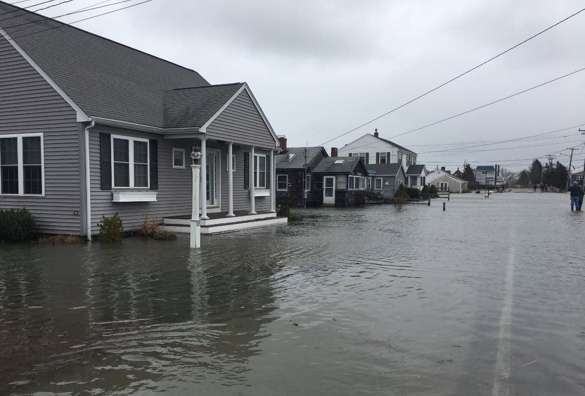 Governor Charlie Baker declared a state of emergency in the aftermath of storm Riley. Pictured here is Marion Street in Marshfield, Mass. Marshfield was just one of the coastal communities hit hard by the storm. (Bruce Gellerman/WBUR)