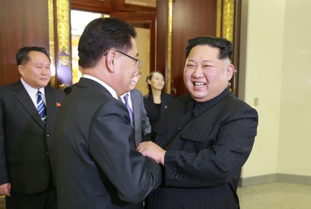 This picture taken on March 5, 2018 and released from North Korea's official Korean Central News Agency (KCNA) on March 6, 2018 shows North Korean leader Kim Jong Un (right) shaking hands with South Korean chief delegator Chung Eui-yong (center), who traveled as envoys of the South's President Moon Jae-in, during their meeting in Pyongyang. (STR/AFP/Getty Images)