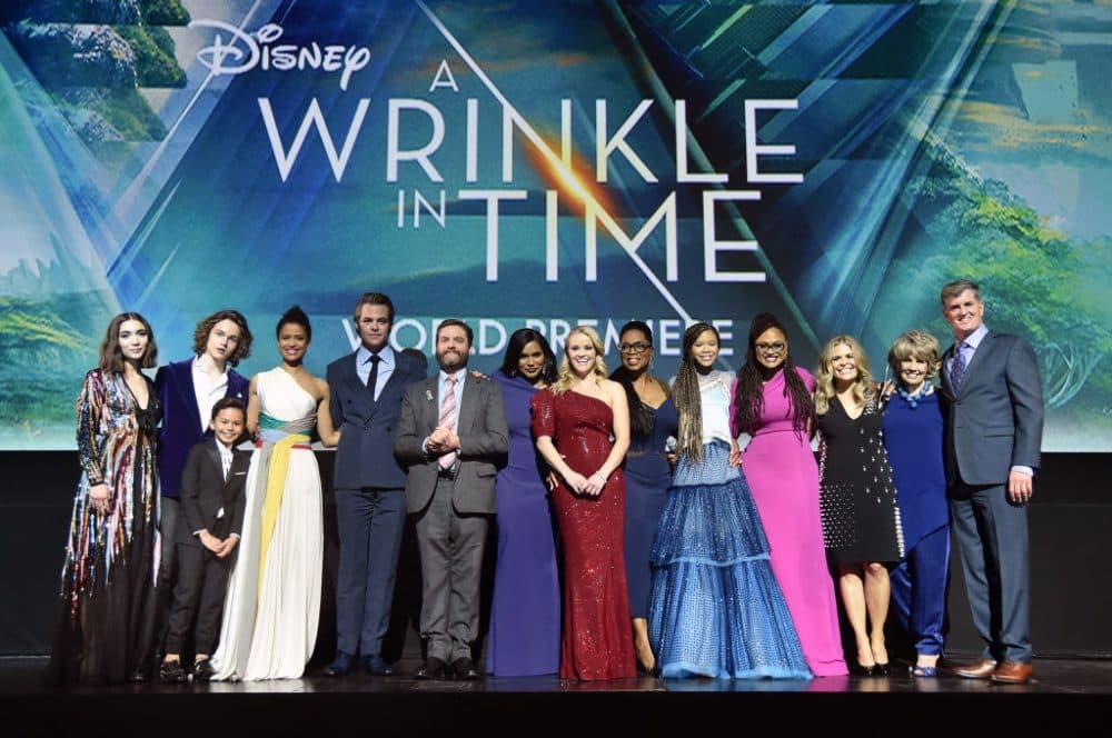 (Left to right) Actors Rowan Blanchard, Levi Miller, Deric McCabe, Gugu Mbatha-Raw, Chris Pine, Zach Galifianakis, Mindy Kaling, Reese Witherspoon, Oprah Winfrey, Storm Reid, along with director Ava DuVernay, screenwriter Jennifer Lee, producers Catherine Hand and Jim Whitaker onstage at the world premiere of Disneys &quot;A Wrinkle in Time&quot; at the El Capitan Theatre in Hollywood Calif., Feb. 26, 2018. (Alberto E. Rodriguez/Getty Images for Disney)