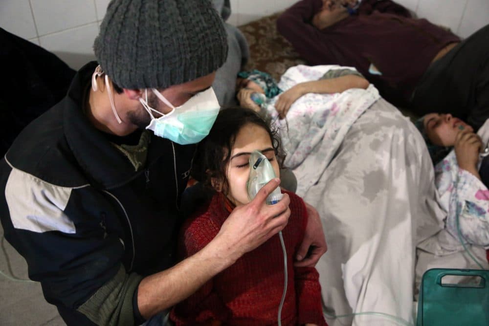 Syrians receive treatment for breathing difficulties at a clinic in Syria's eastern Ghouta on March 7, 2018, after regime airstrikes. (Amer Almohibany/AFP/Getty Images)